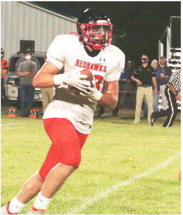 Red Hawks Score Key Football Victory Over Savage