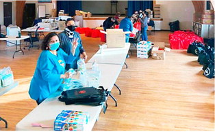 FPCC Staff Prepare Thanksgiving Bags For Students