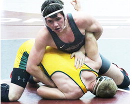 Wolf Point Wrestlers Battle  During Action Against Teams