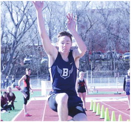 Bainville Scores At Track Meet