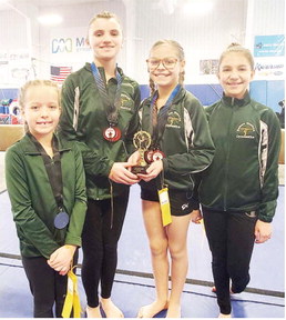 Gymnasts Compete At Mandan Meet