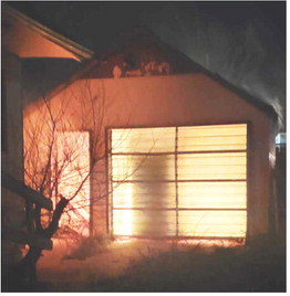 Fire Destroys Garage